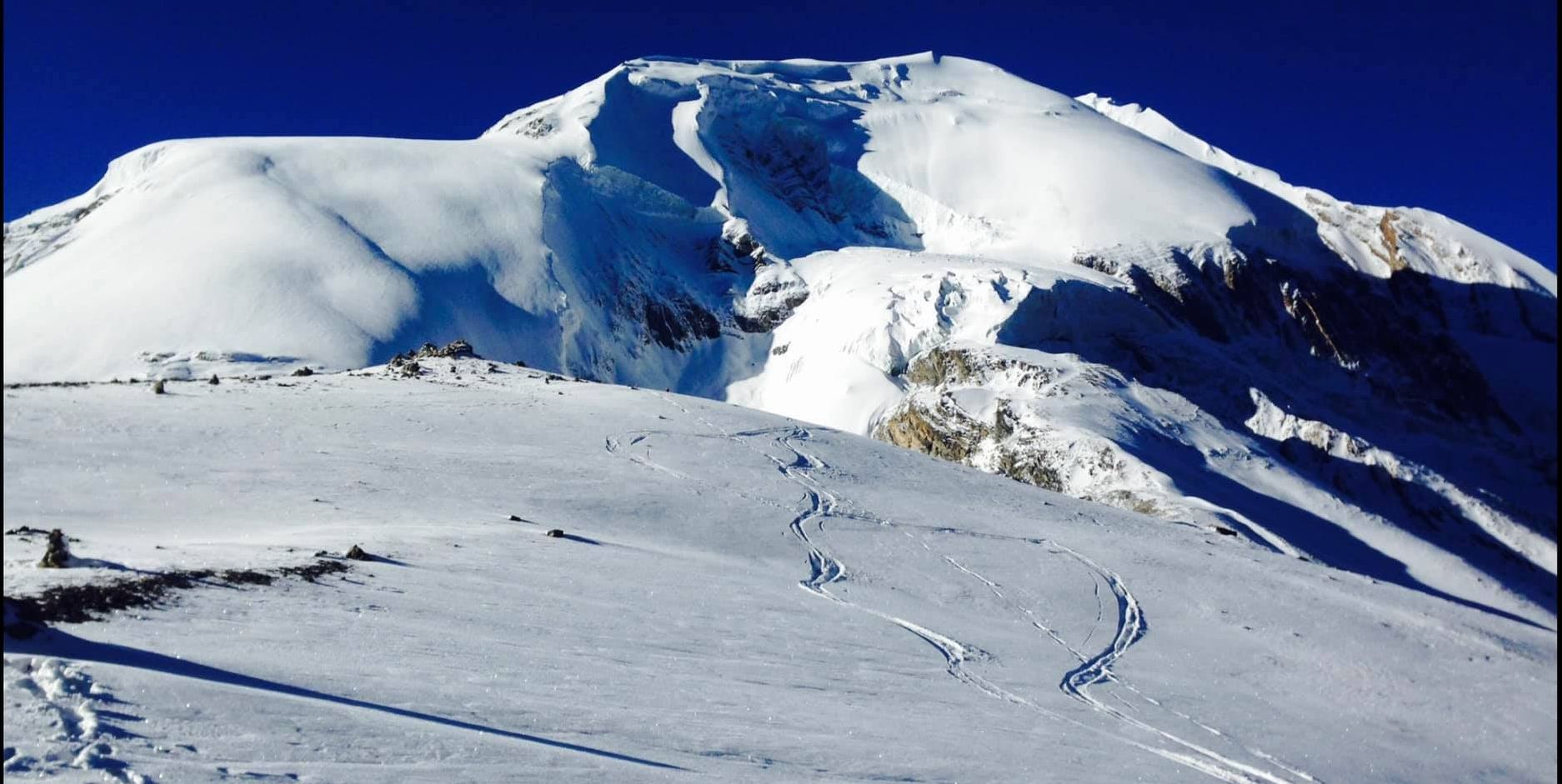 Tharong Peak ( Thorong Ri ) above Tharong La on crossing Tharong La high pass on Annapurna circuit trek in the Nepal Himalaya