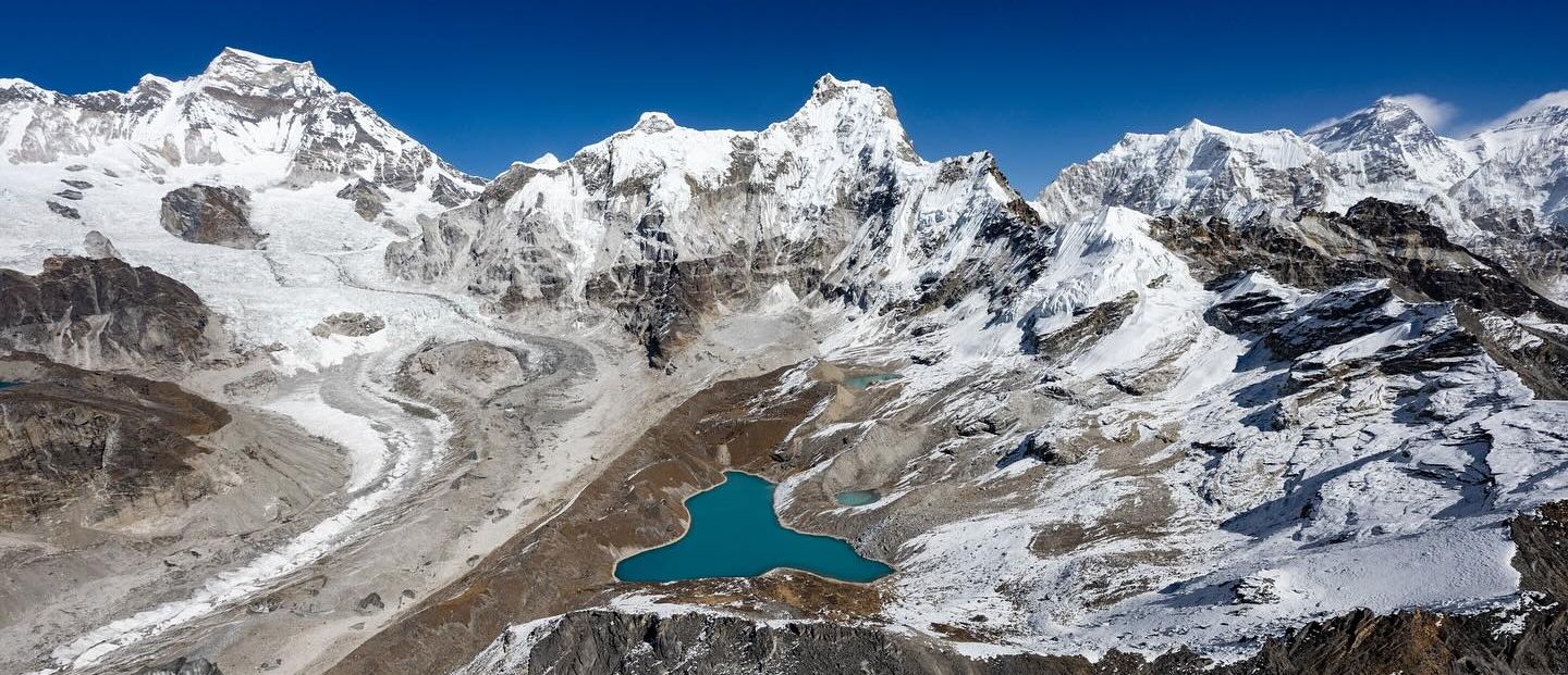 Gyachung Kang, Cha Kung and Everest from Ngozumpa Glacier in Gokyo Valley