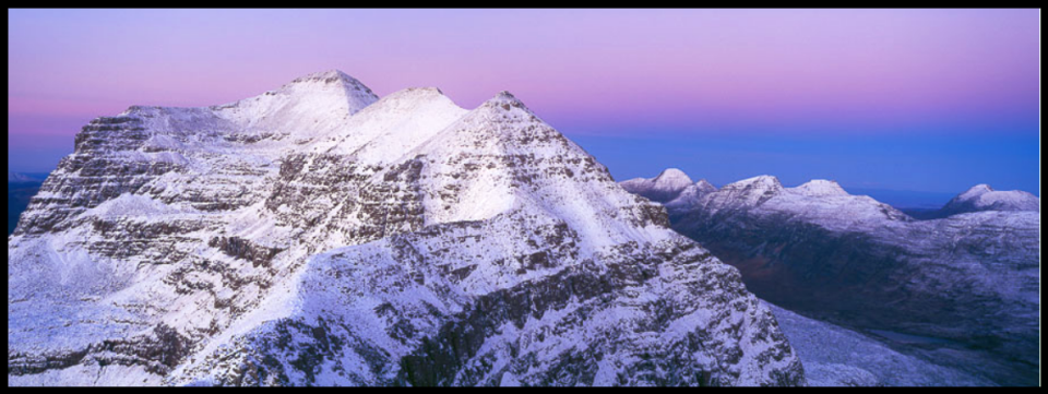 Snow-bound summit ridge of Liathach in winter in the Torridon Region of the NW Highlands of Scotland